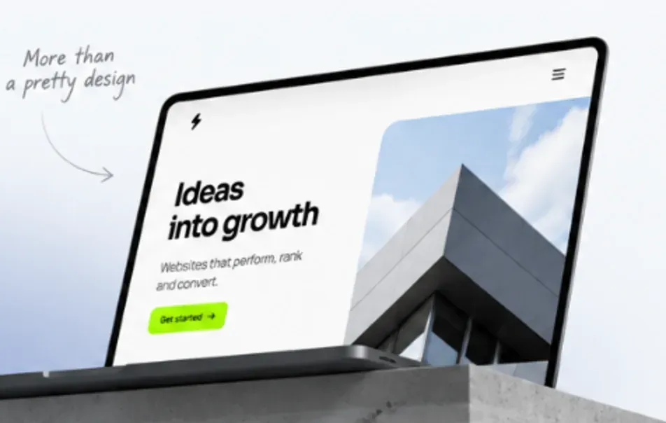 Laptop showing a business website with the headline Ideas into growth